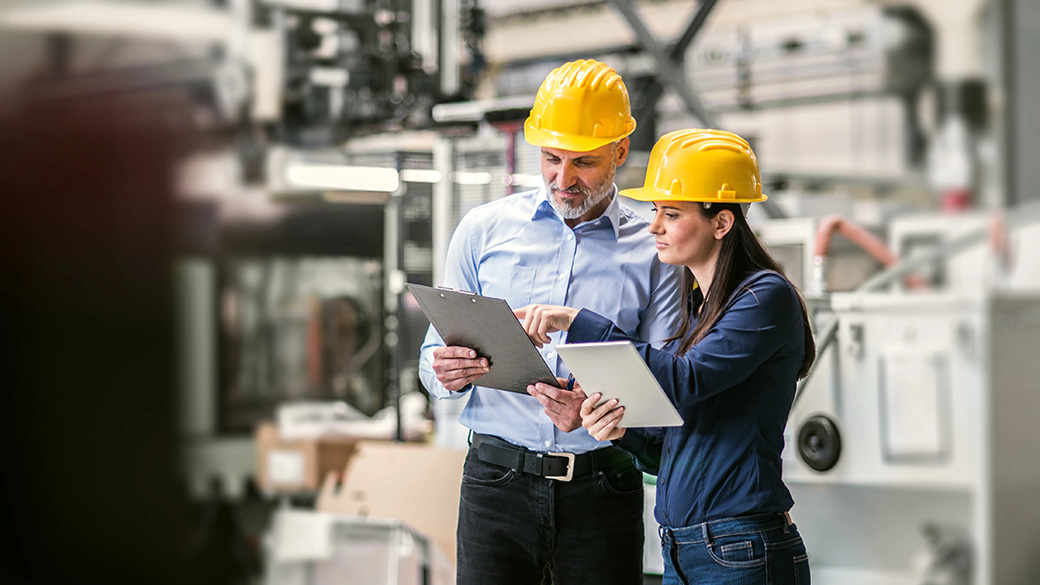 MFG-engineers-with-tablet-in-a-factory.jpg