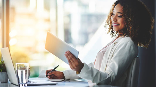 businesswoman working at her desk in an office